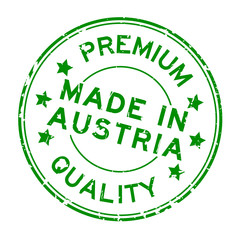 Grunge green premium quality made in Austria round rubber seal stamp on white background