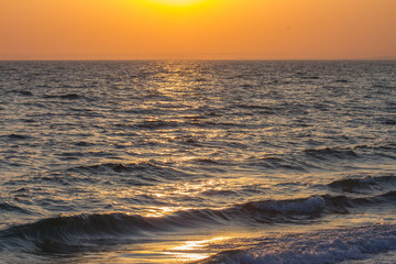 Fototapeta na wymiar Sunset in ocean beach. sunset in sea