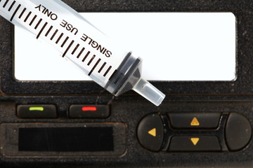 Old and dirty pager in the scene have syringe at the screen also.