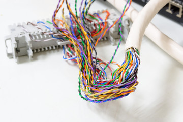 Telephone cabling patch panel with twisted pairs cables for digital and analog phone connection