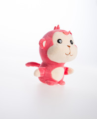 toy or monkey soft toy on the background.