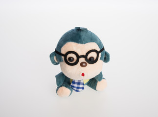 toy or monkey soft toy on the background.
