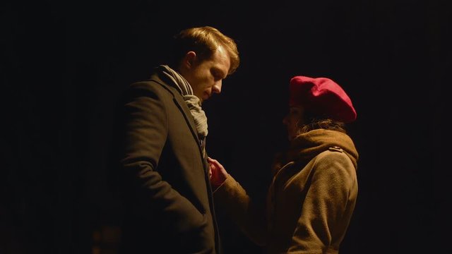 Couple separating after date, good-bye kiss, romantic evening ending with fiasco