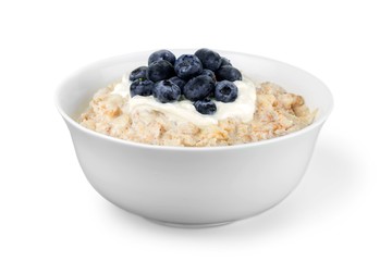 Isolated white bowl with fresh porridge on the white