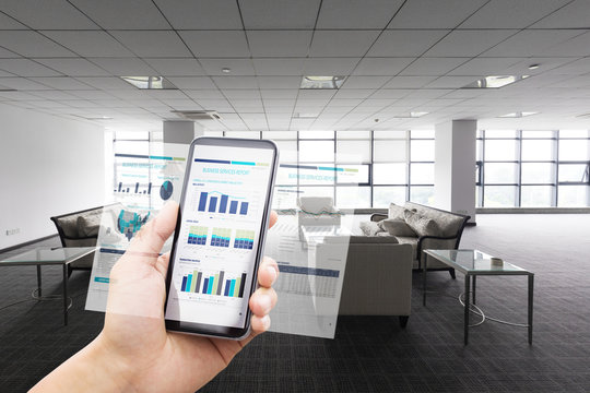 smart phone with business chart with modern lobby