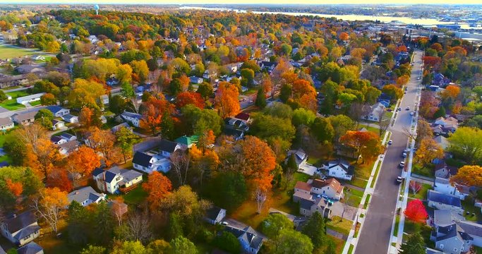 Colorful neighborhoods of Sturgeon Bay, Wisconsin, Autumn aerial flyover.
