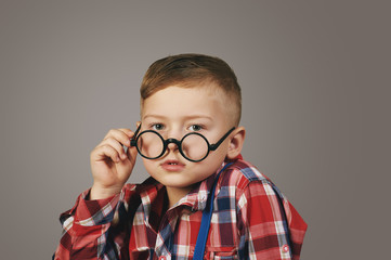 portrait of a boy . Stylish boy posing in Studio