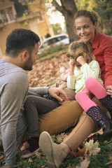 Parents spending time with children have play.