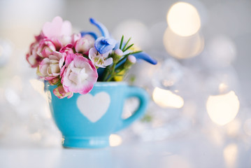 cup with flowers