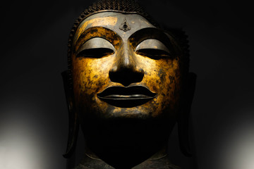 Buddha Face on Black Background