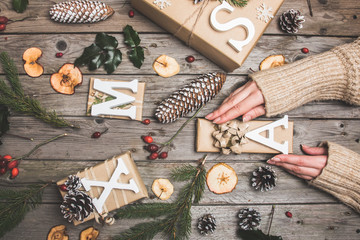 New Year composition on a wooden table. Christmas background. Flat lay.Top view