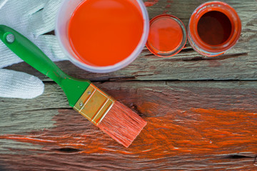 Wood painting, hand holding a brush, furniture restoration, Varnishing a wooden shelf using...