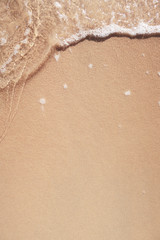 wave on sandy beach