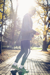 Man working with jump rope. On the move.