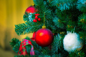 Christmas decorations on the branches of fir tree