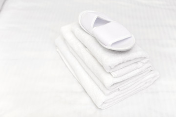 Clean towels on bed at hotel room
