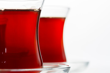Turkish tea in traditional glass isolated on white background