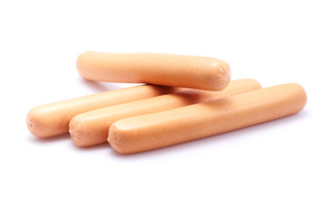 Frankfurter sausage isolated on white background with herbs and peppercorns