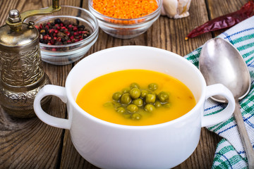 Soup puree from red lentils and canned green peas