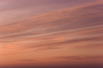 Fototapeta na wymiar Pink sunset on the frozen reservoir.