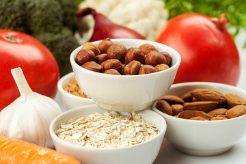 Fresh raw vegetables with nuts and cereals for cooking or eating. Vegetarian food.