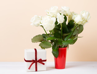 Roses in vase with box
