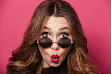 Close up portrait of a shocked pretty girl