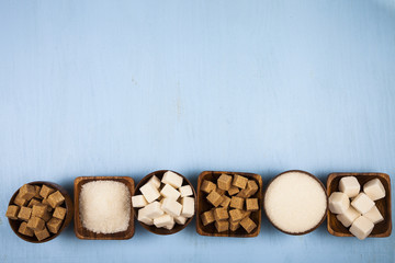 Six  bowls of sugar, top view