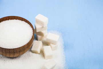 Sugar in a wooden bowl