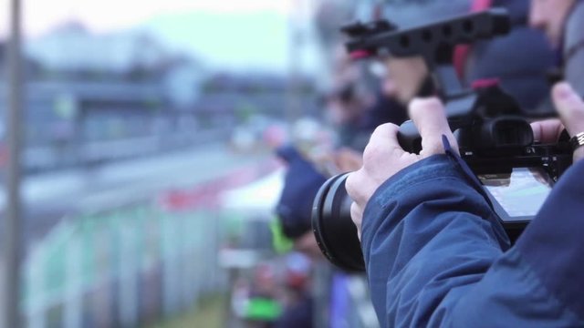 Photographer at MotorShow Event, Slow Motion