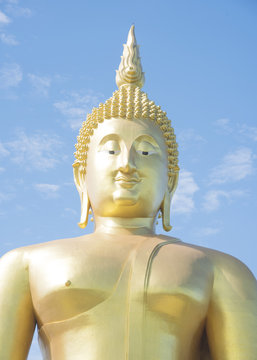 Golden Buddha statue at Wat Muang temple in Angthong, Thailand