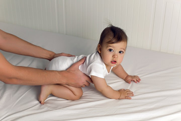 Fototapeta premium baby boy sitting at his father