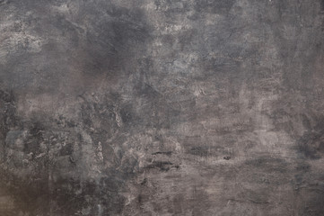 Dark grunge background looking like a stone