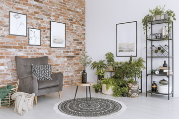 Relax room with grey armchair