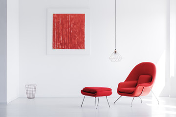 White interior with red painting