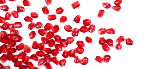 Pomegranate seeds isolated on white background, top view