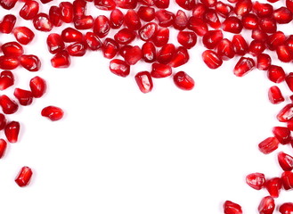 Pomegranate seeds isolated on white background, top view