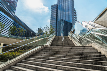 the Stairs with modern buildings under blue sky