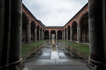 the churchyard of one of the oldest churches in Milan, Italy