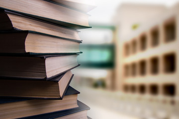 Abstract business modern city urban futuristic architecture background. Real estate concept, motion blur, reflection in glass of high rise skyscraper facade, toned blue picture with bokeh