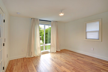 Light and bright empty family room interior