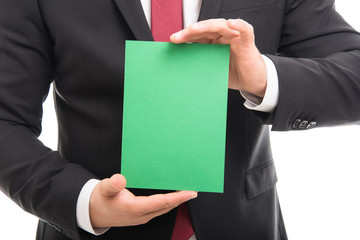 Close-up of manager showing blank green cardboard