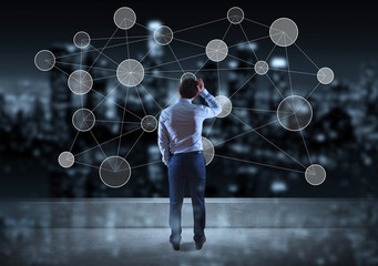 Businessman watching social network interface on a rooftop 3D rendering