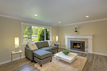 Classic living space with a white fireplace