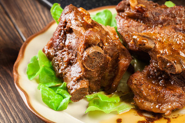 Pork spare ribs served on a plate