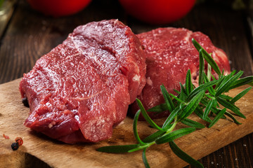 Fresh raw beef steak sirloin with rosemary