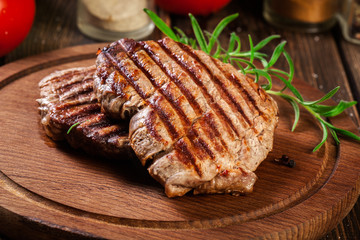 Succulent portions of grilled fillet mignon served with rosemary