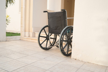Fototapeta na wymiar wheelchair outside the house
