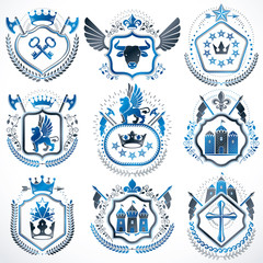 Fototapeta premium Set of vector retro vintage insignias created with design elements like medieval castles, armory, wild animals, imperial crowns. Collection of coat of arms.
