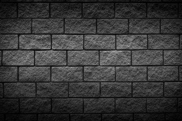 Black brick stone texture background.